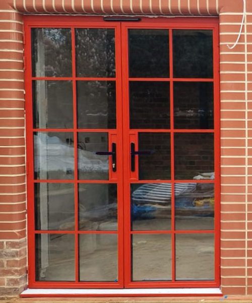 Aluco Exterior French Doors In RAL 3016 Coral Red.jpg